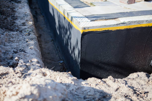 Professional Waterproofing technician working in North Robinson, OH